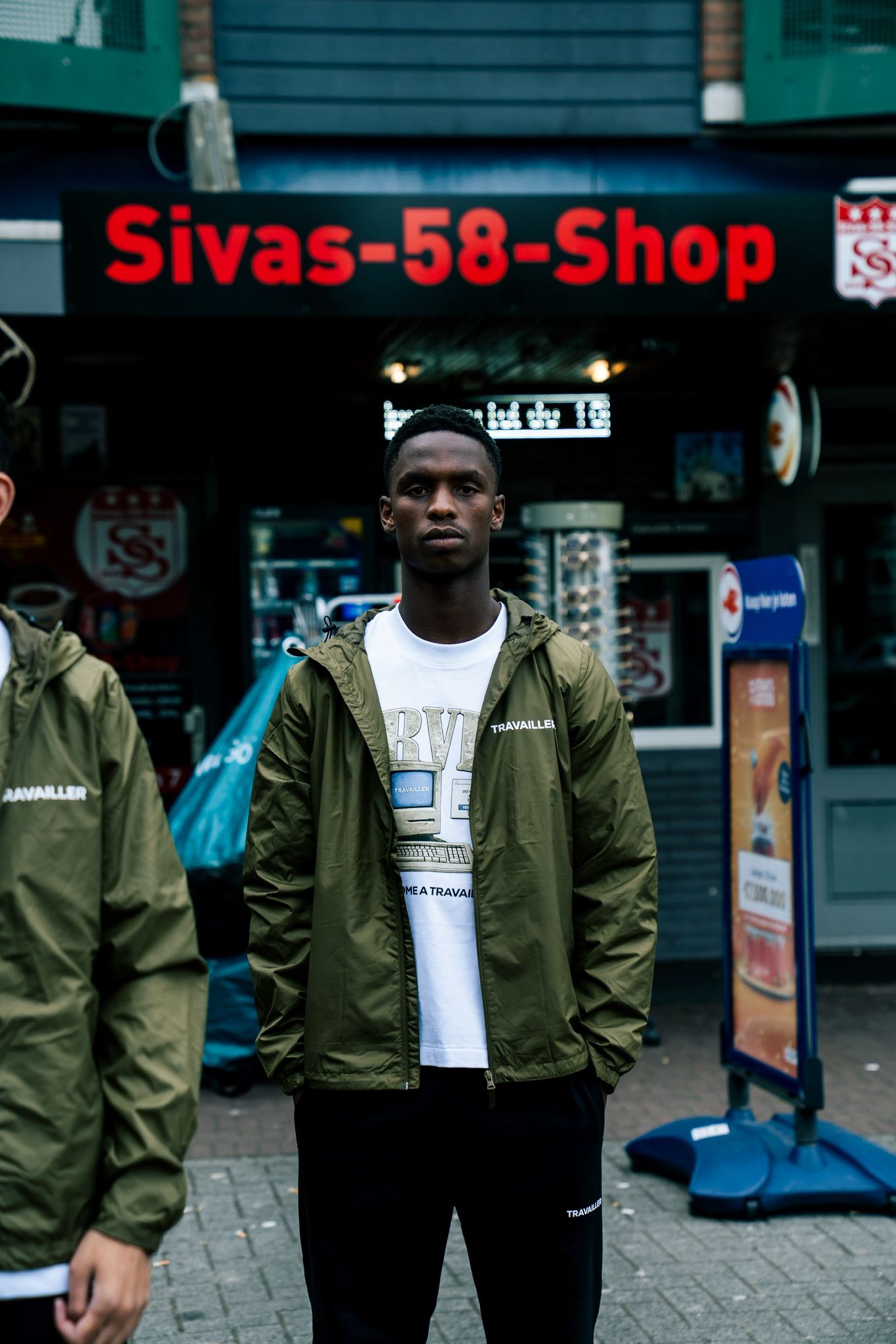 OLIVE GREEN WINDBREAKER